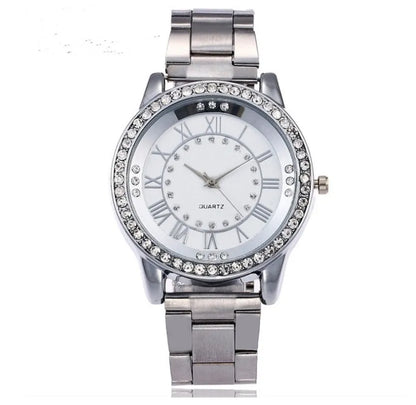 Vansvar women's quartz dress watch with 40mm round dial, alloy strap and rose gold or gold colour option