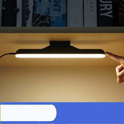 Creative modern white plastic desk lamp with touch control panel and soft LED light beads.