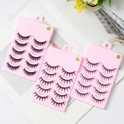 Set of manga-style false eyelashes in natural wispy styles 007, 008, and 009 on plastic black terrier