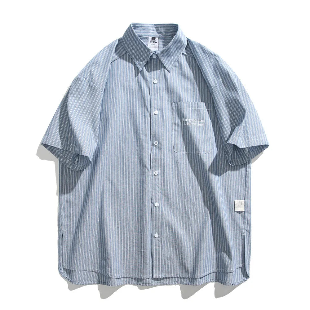 Blue and white striped loose-fitting short-sleeved overalls shirt on a hanger.