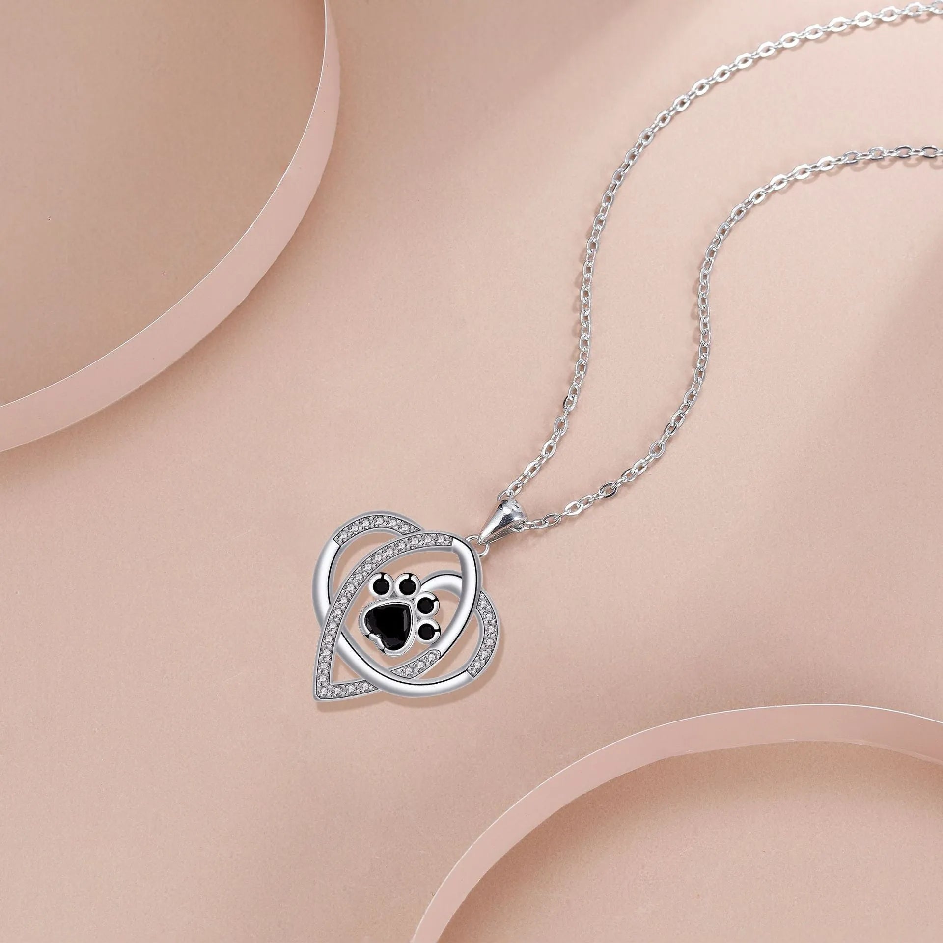 Women's copper necklace with dog paw print pendant on cross chain, electroplated finish