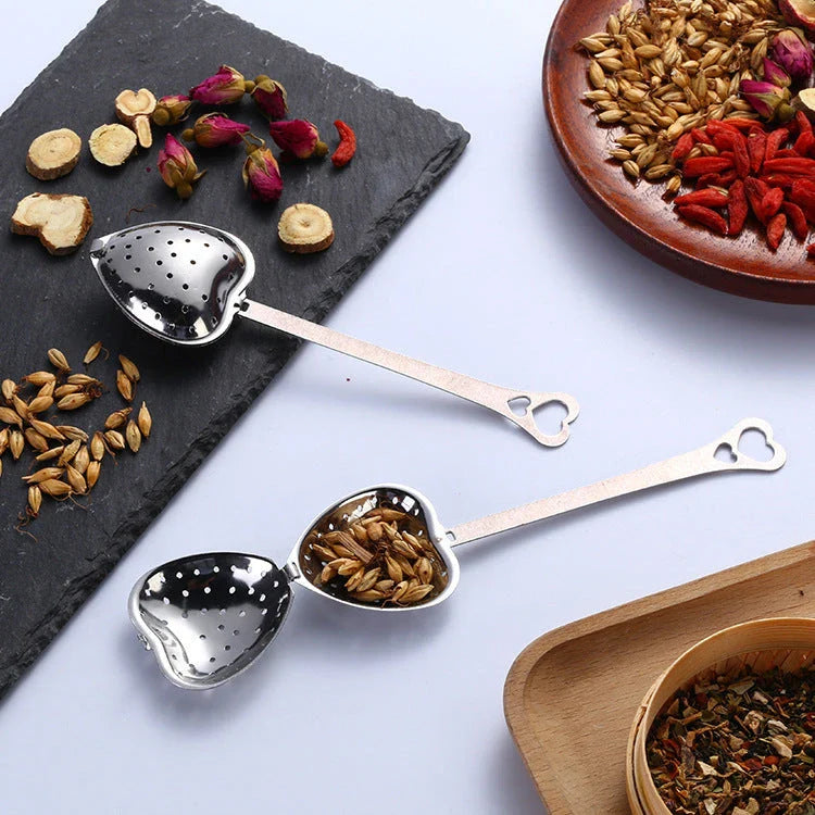 Premium stainless steel tea infuser with heart-shaped design, suitable for brewing loose-leaf teas, herbs, and spices