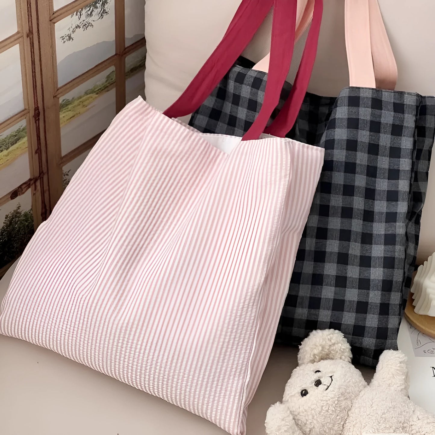 Light pink striped cotton canvas multi-layer tote bag with a wide shoulder strap.