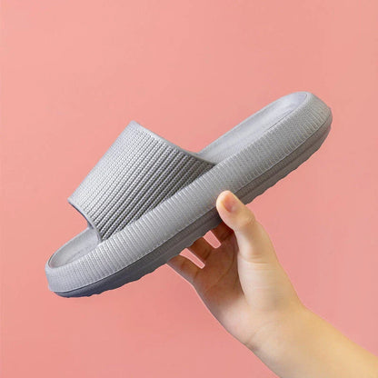 Unisex EVA slippers in various colors, including white, yellow, green, blue, black, khaki, grey, pink, and orange