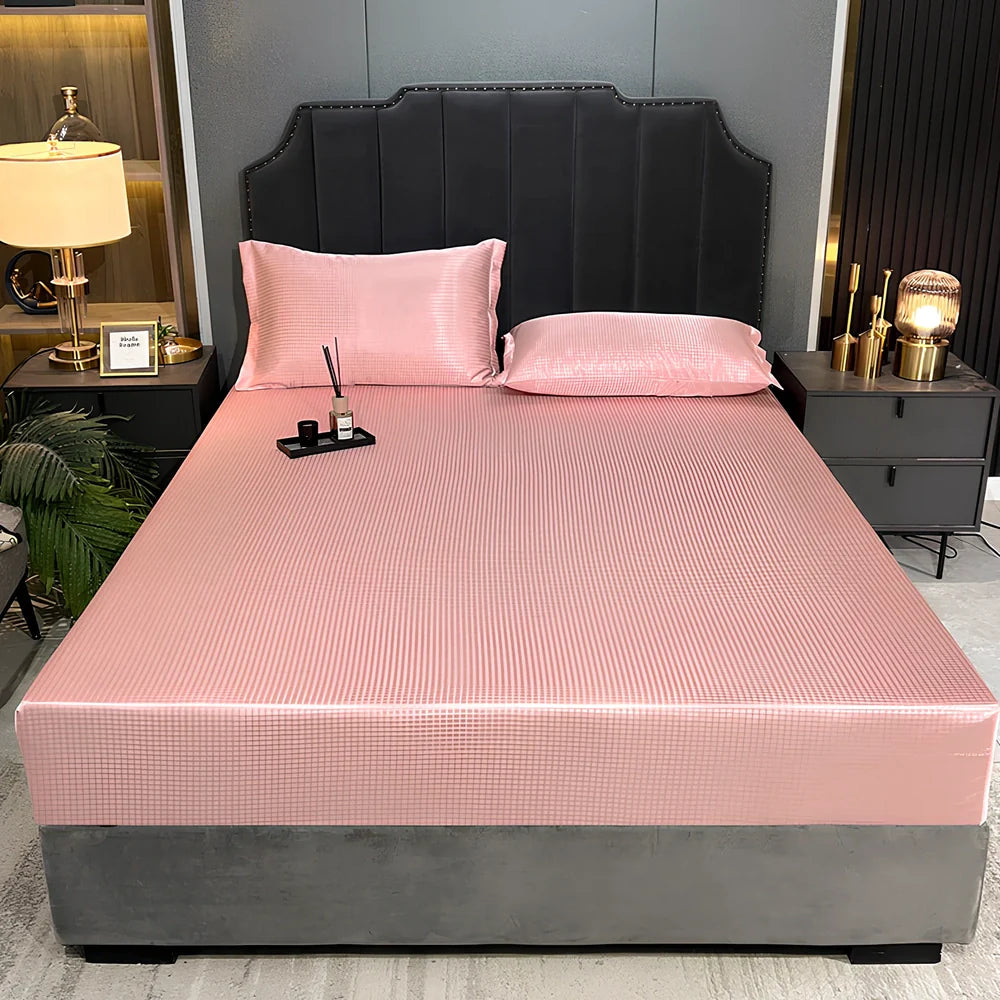 Houndstooth ice silk jacquard fitted three-piece bedding set in ice blue, 180x200cm size with pillowcases on white bed