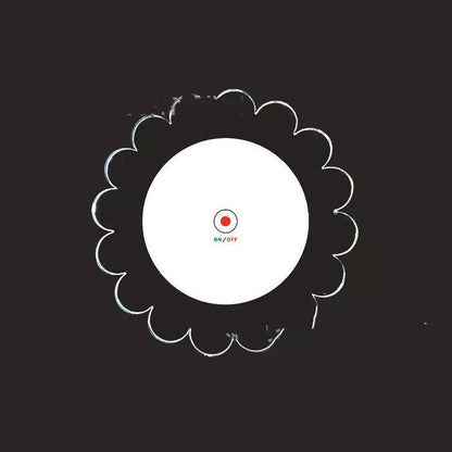 LED Glow Coaster with vibrant colors illuminating a cocktail glass