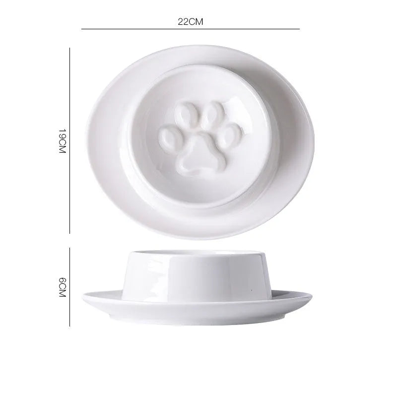 Green ceramic slow feeder bowl for pets with high walls and a non-slip rubber base.
