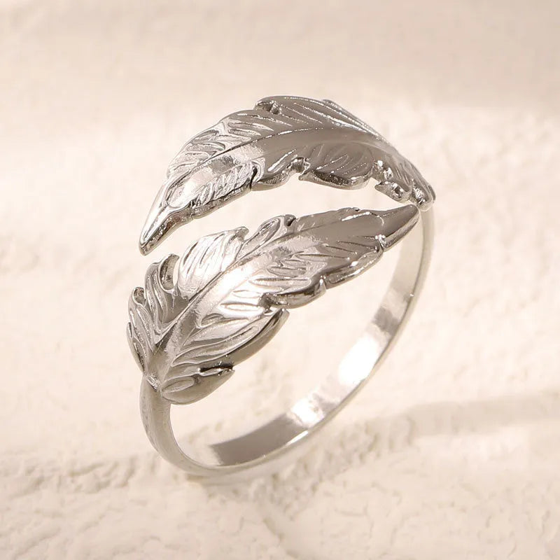 Women's adjustable stainless steel feather ring in gold or silver colour