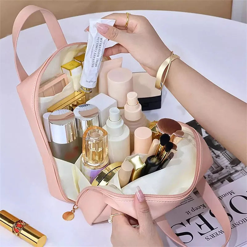 Shell-shaped waterproof PU leather cosmetic bag in various colors