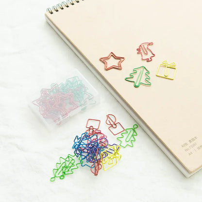 18 colourful Christmas-themed special-shaped metal paper clips in OPP bag packaging