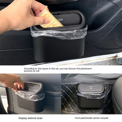 Black plastic folding car trash can mounted on vehicle seat back