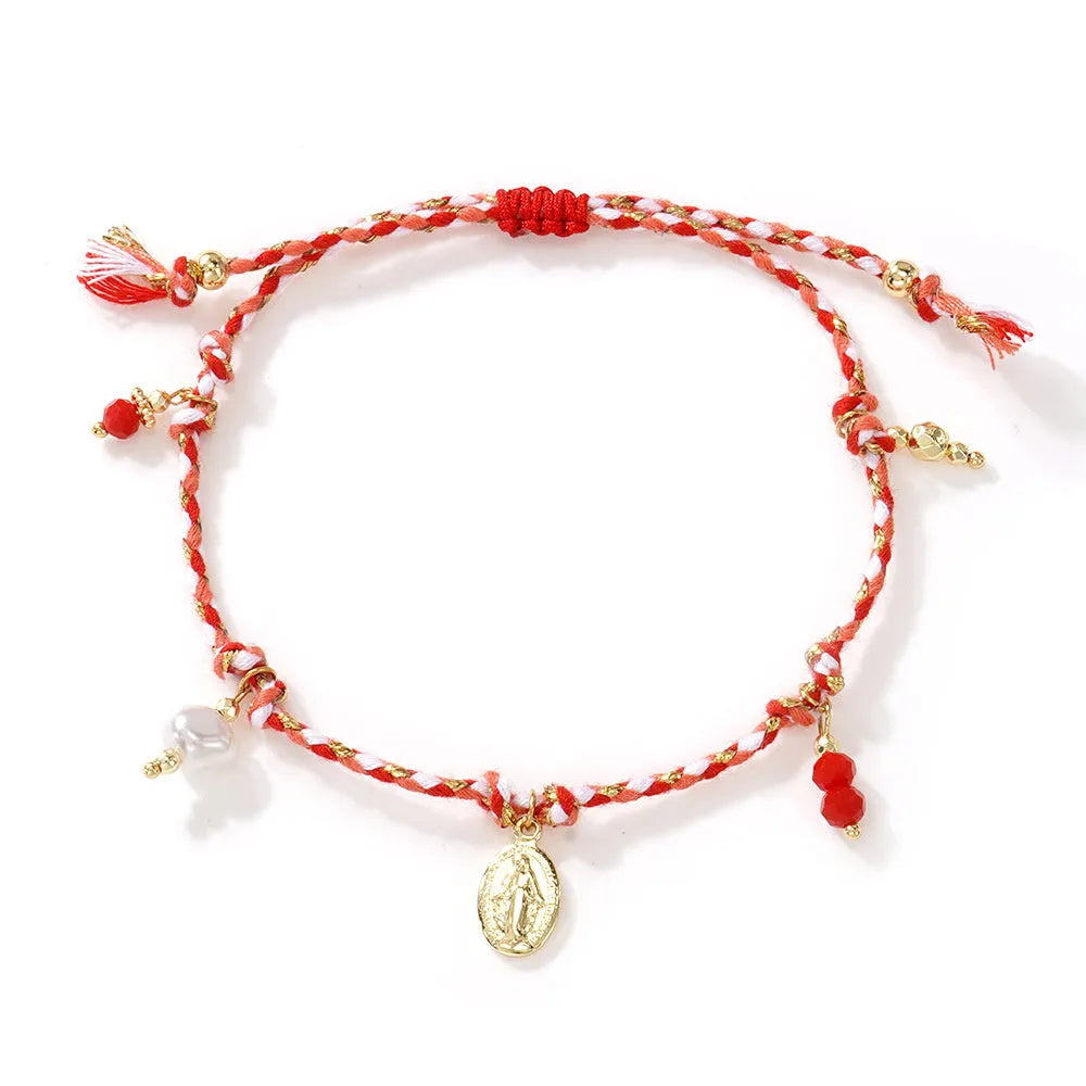 Close-up of a colourful hand-woven braided rope bracelet for women, showing ethnic strap design.