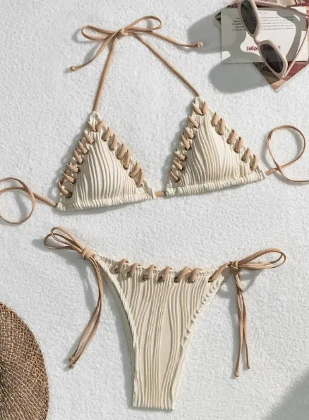 Women's solid colour polyester bikini with eye rope detail, briefs style, sizes S M L