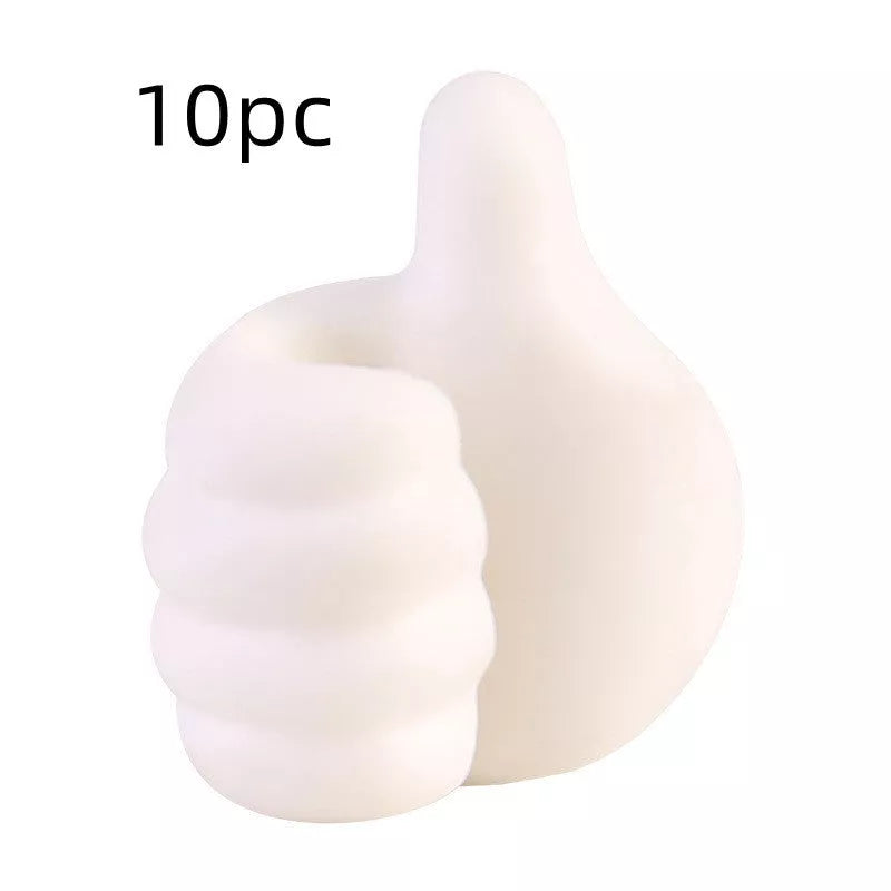 Silicone thumb wall hooks in various colors for organizing kitchen and bathroom items