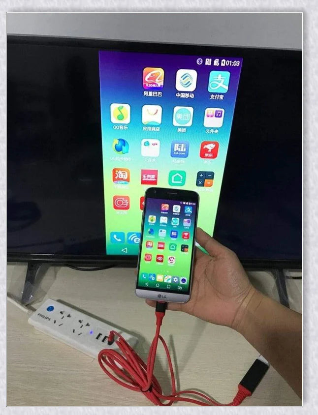 Phone to TV Adapter, a compact device that connects your smartphone to your TV for a big-screen viewing experience