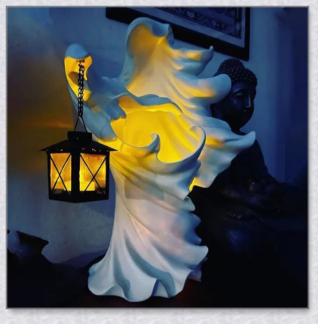 Spookydoo Halloween Witch/Ghost Resin Statue with battery-powered lantern, adding a spooky glow to indoor or outdoor Halloween decor