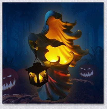 Spookydoo Halloween Witch/Ghost Resin Statue with battery-powered lantern, adding a spooky glow to indoor or outdoor Halloween decor