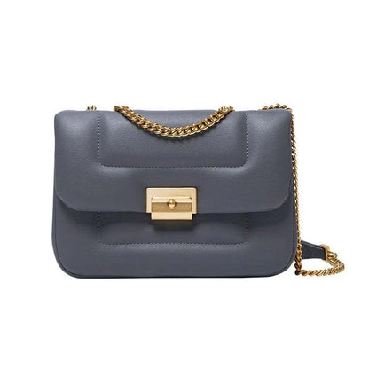 Premium grey split leather crossbody bag with adjustable metal chain strap, showcasing a compact and stylish design