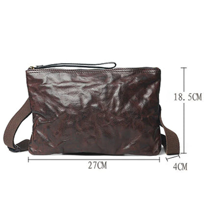 Handmade vintage-inspired leather crossbody bag with ruffled design and zipper closure