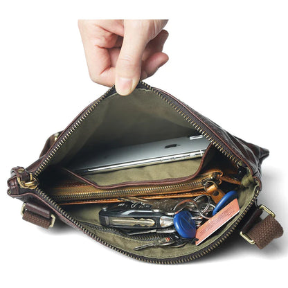 Handmade vintage-inspired leather crossbody bag with ruffled design and zipper closure