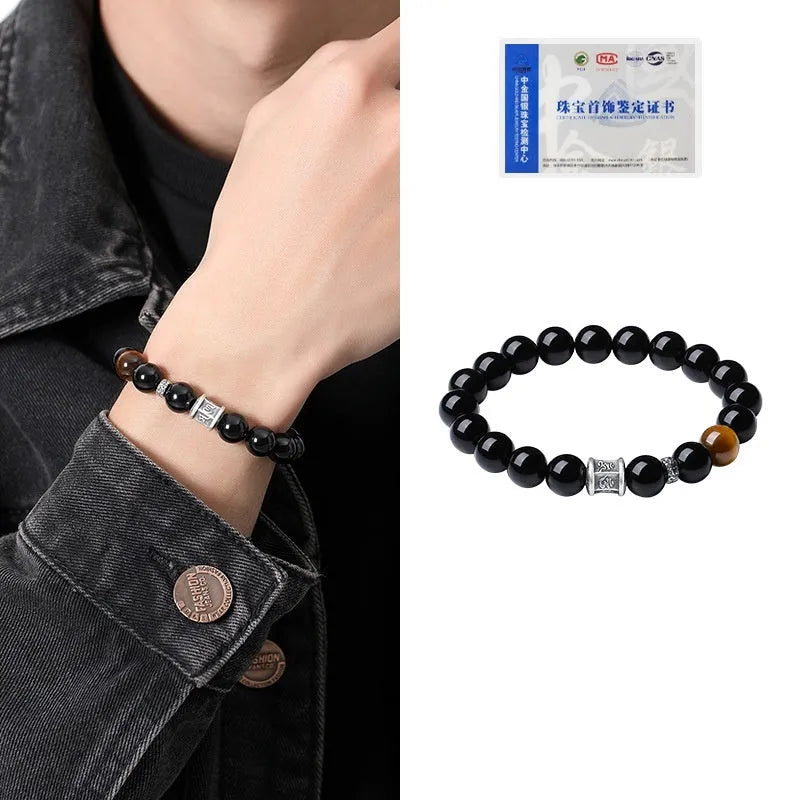 Men's black obsidian prayer wheel bracelet with hand-woven construction and 10mm beads