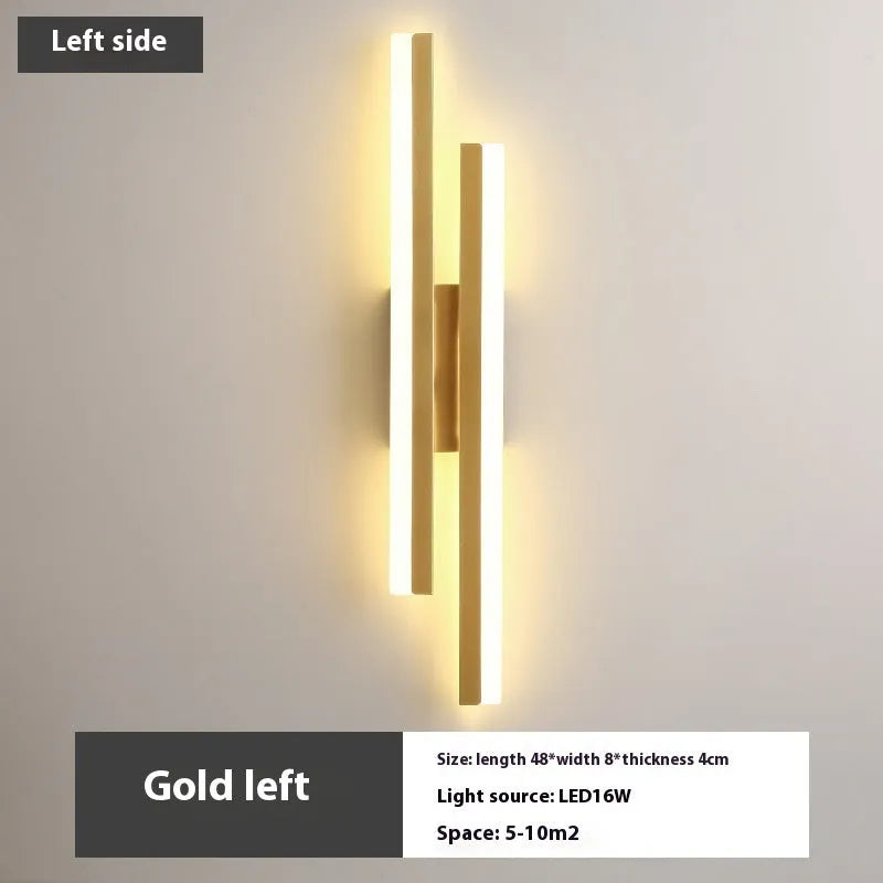 Scandinavian minimalist LED wall light with acrylic shade and adjustable arm in black or gold finish.