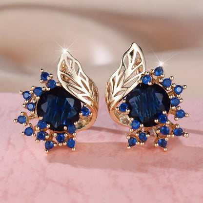 Round flower and feather design earrings in champagne gold with a choice of coloured zircon stones.