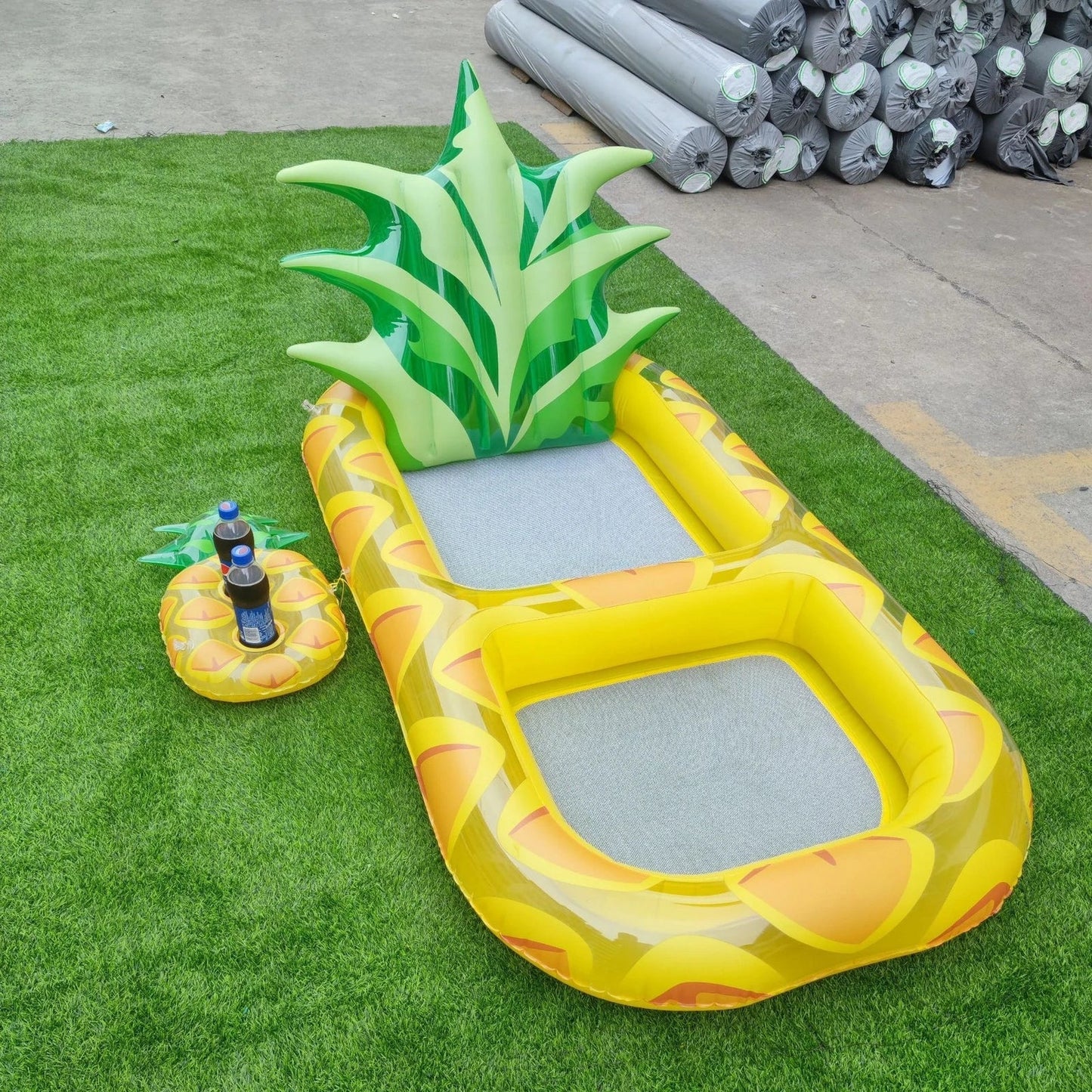 Yellow pineapple-shaped inflatable pool float with drink holder and ergonomic headrest design