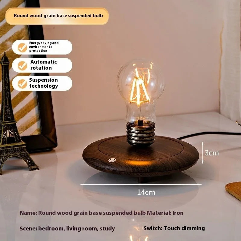 Suspension bulb night lamp on black wood grain base with iron art frame, 11cm square dimensions