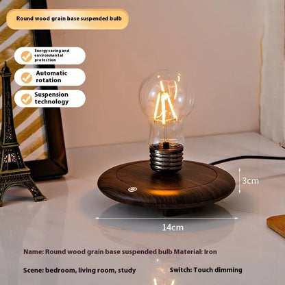 Suspension bulb night lamp on black wood grain base with iron art frame, 11cm square dimensions