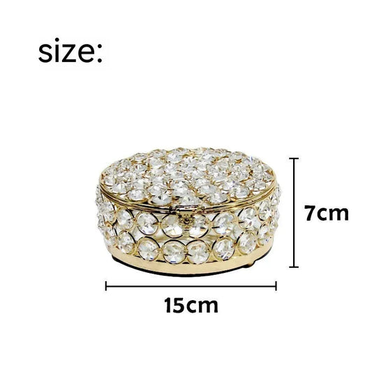 French gold iron jewellery box with crystal glass panels showing jewellery inside
