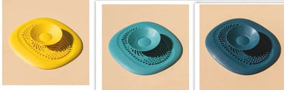 TPR vortex design sink drain cover in twilight orange, quiet blue, mango yellow, and gentian green