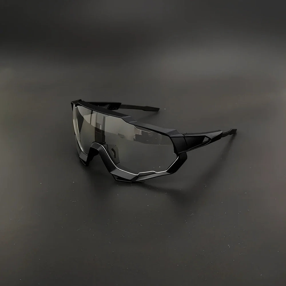 Cycling glasses with interchangeable lenses showing UV400 protection and lightweight frame design