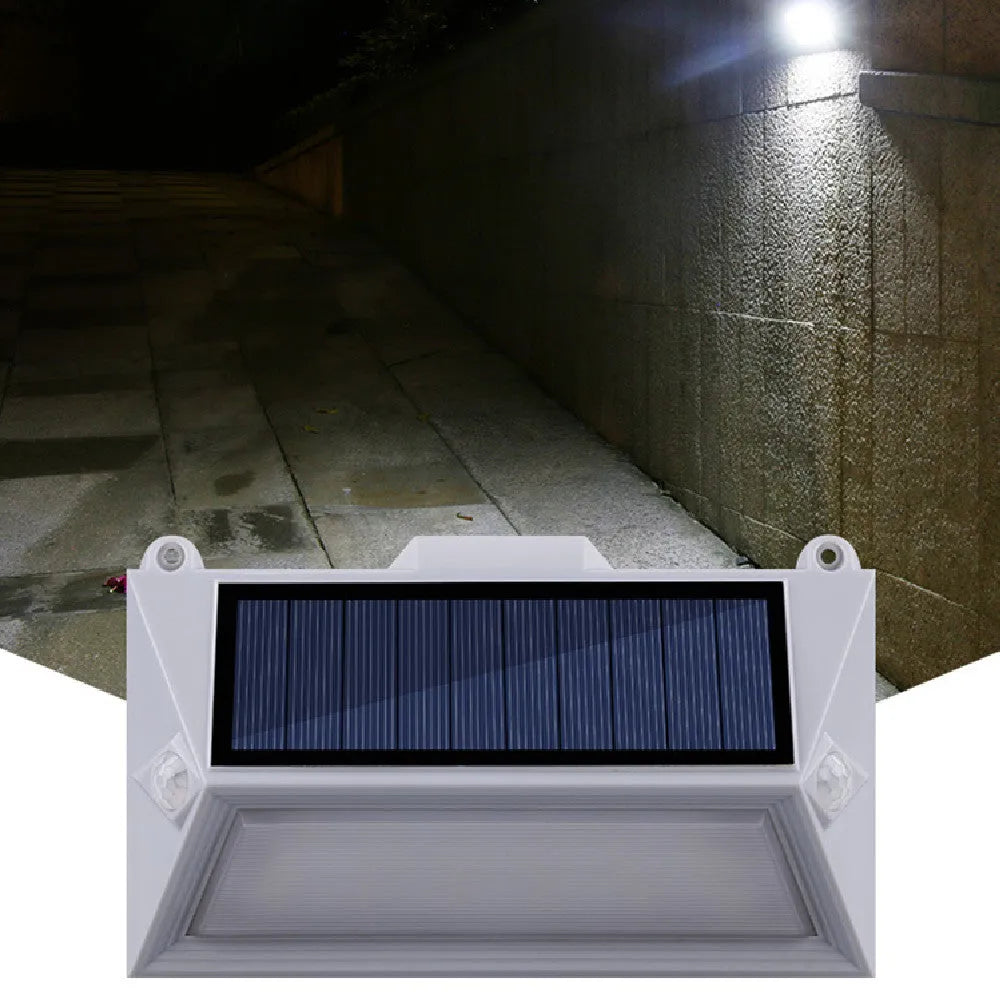 Solar outdoor human body induction step light with abstract design for steps and pathways
