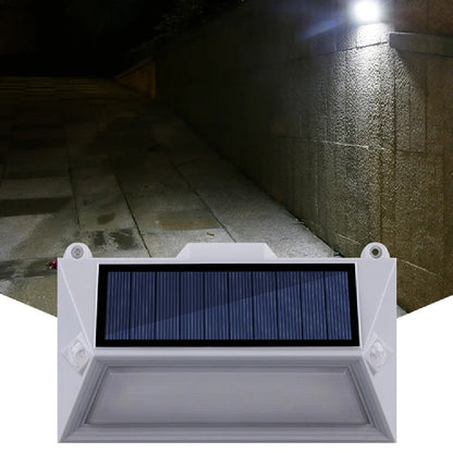Solar outdoor human body induction step light with abstract design for steps and pathways