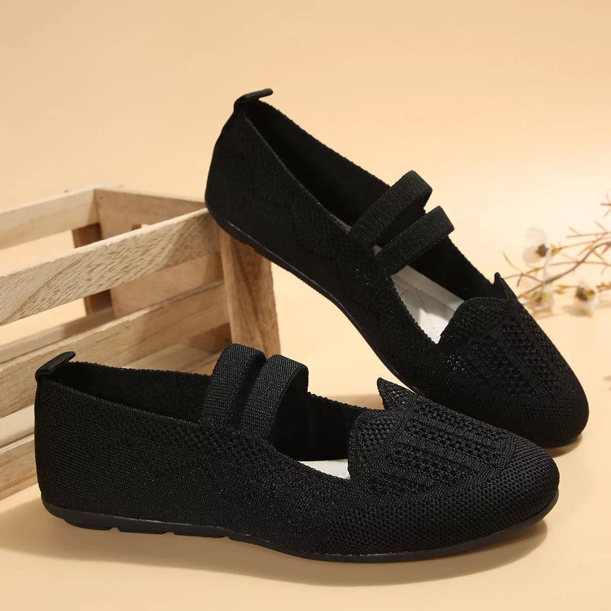 Women's casual mesh flats in black and khaki with round toe and slip-on design
