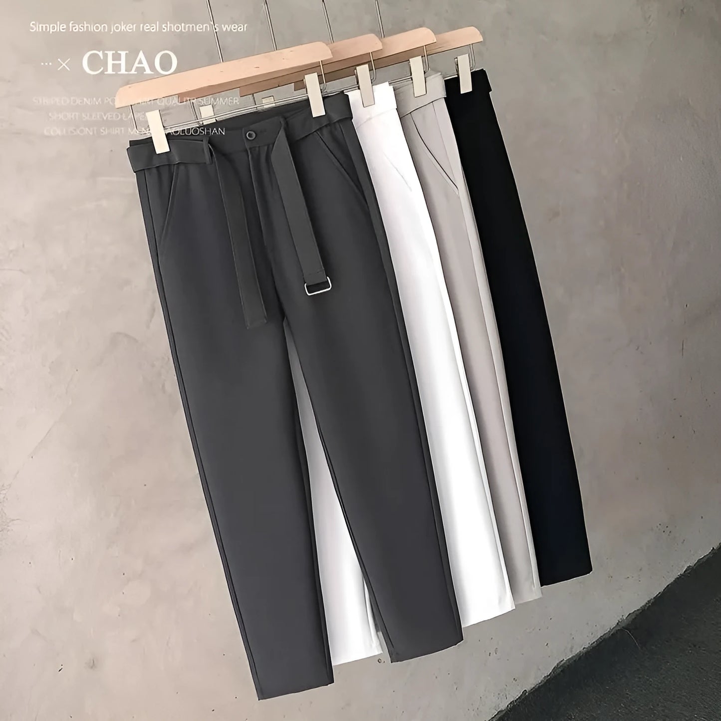 Boys slim straight wool trousers in a tapered fit, shown in a light grey colour.