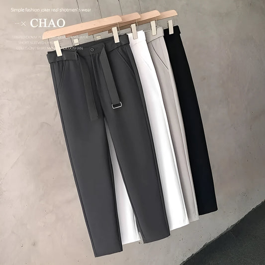 Boys slim straight wool trousers in a tapered fit, shown in a light grey colour.
