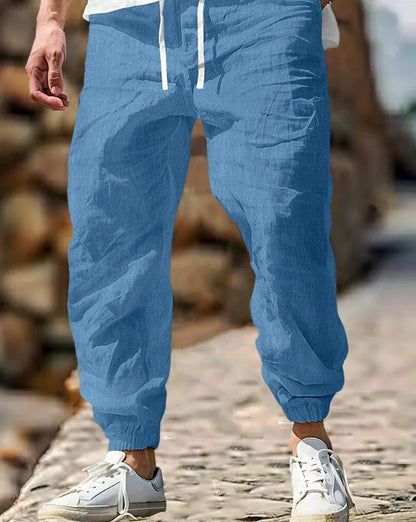 Men's straight-leg cotton trousers with elastic waist in Army Green colour, showing classic fit and summer-appropriate fabric.