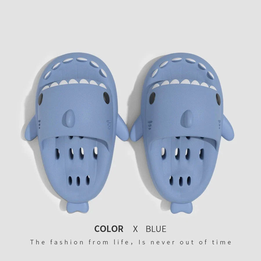 Colorful shark-themed shower slides with drainage holes, designed for comfortable and practical use in the pool or shower.