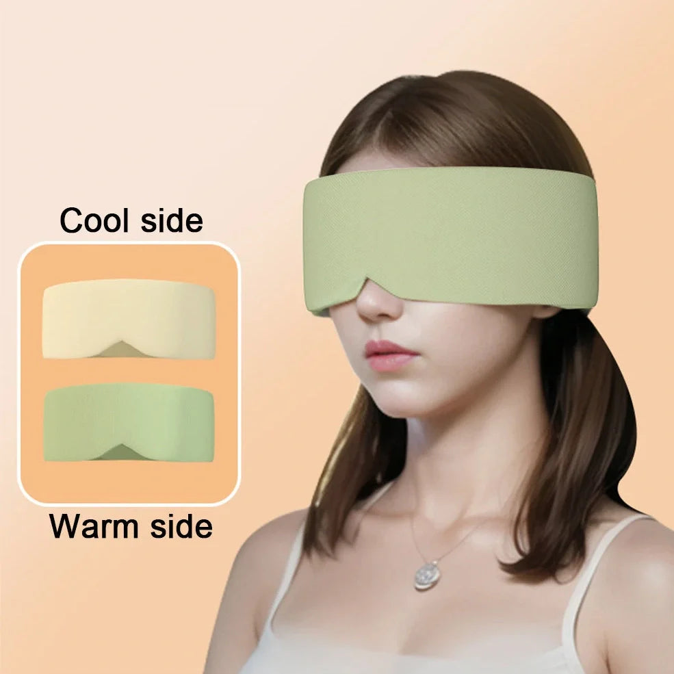 Gray double-sided sleep mask showing cool ice silk side and warm cotton side with adjustable magic tape closure