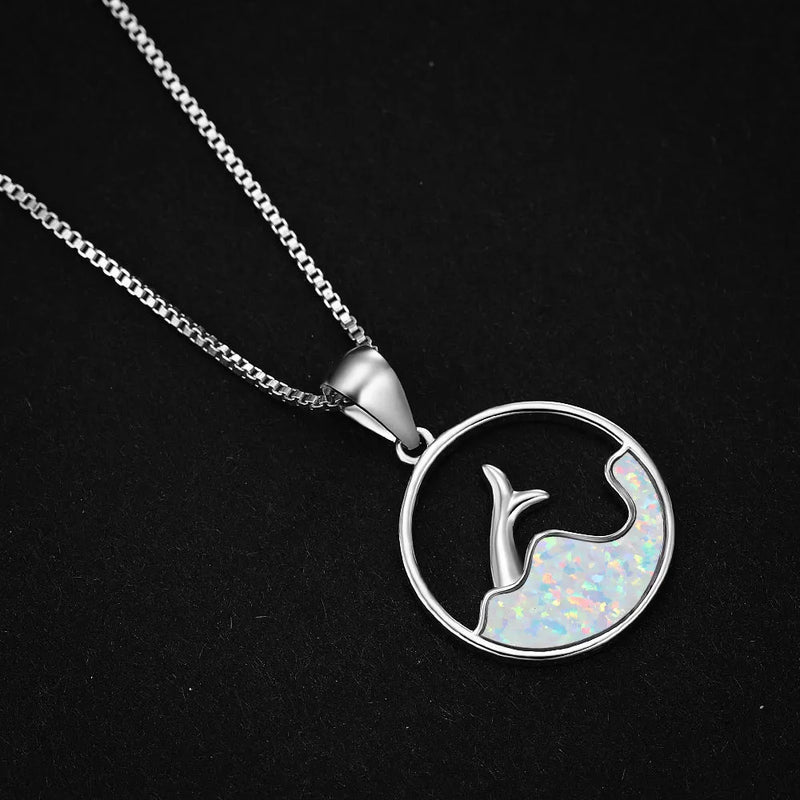 White gold round blue opal sea fishtail necklace: a handcrafted copper electroplated pendant with a 3cm diameter, featuring a platinum blue opal centrepiece and adjustable 45-50cm chain for versatile styling.