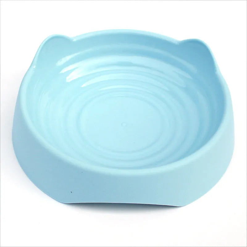 Blue ceramic dog bowl with internal maze pattern for slowing down fast-eating puppies and dogs.