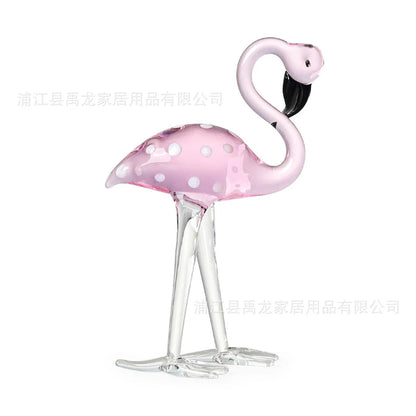 Pink crystal flamingo decorative ornament on table, 15cm tall with modern simplicity design