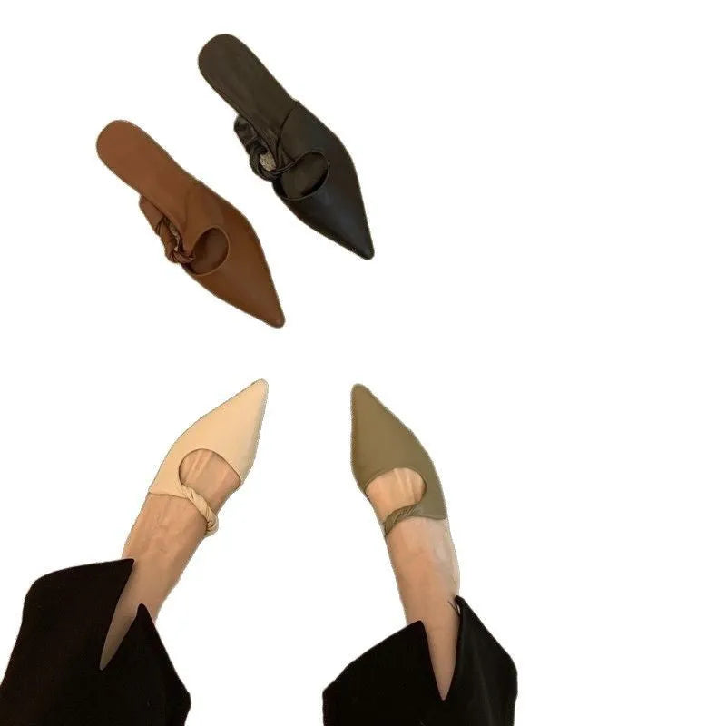 Women's soft leather slippers with semi-toe box in black, khaki, cream-white, and dark brown colours on a rubber sole.