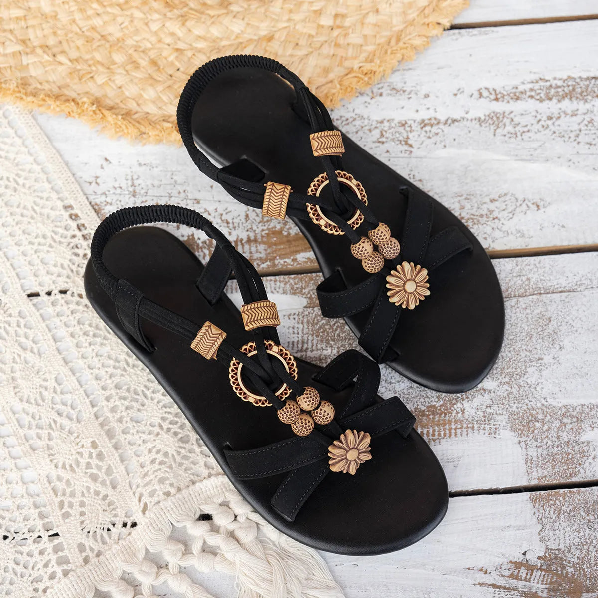 Black ethnic style women's beach sandals with beaded weave, rhinestone decoration, and elastic band closure