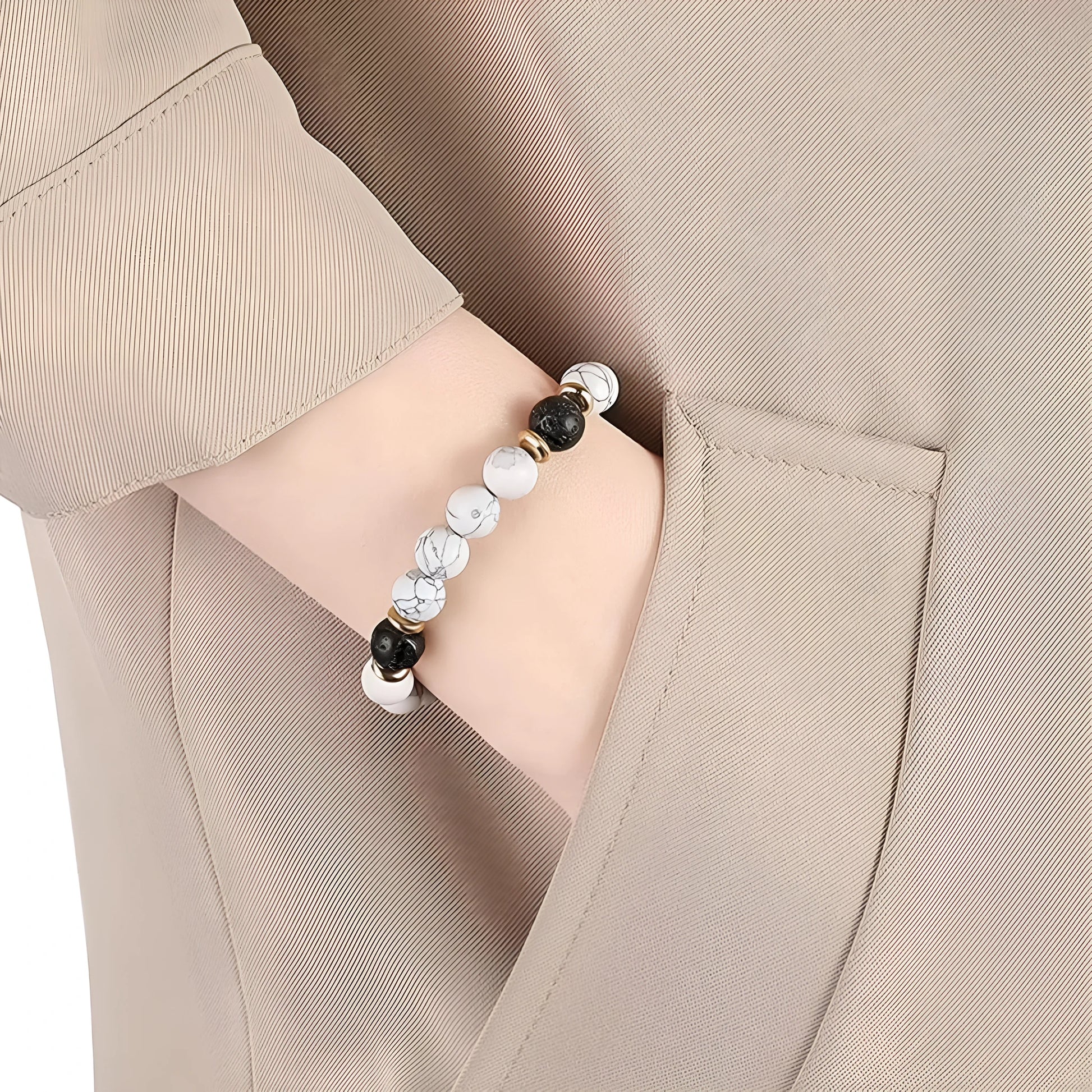 Handcrafted natural stone bracelet with alloy volcano white turquoise charm in a simple design.