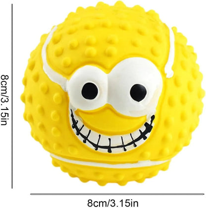 Green, orange, and yellow latex dog balls with smile face designs for chewing and play