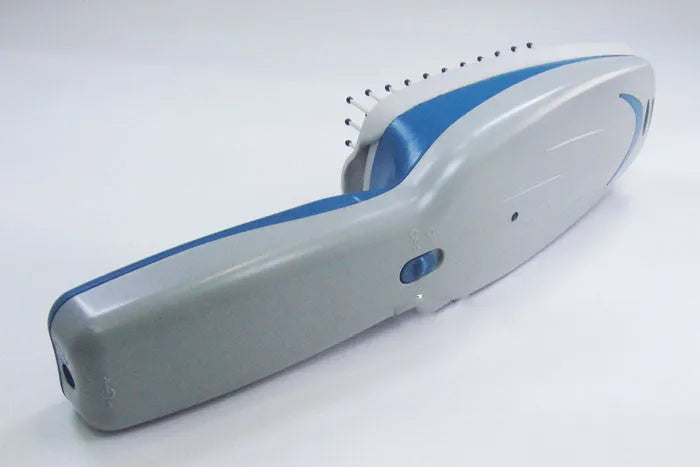 White pet grooming comb with negative ion and ozone technology, removable brush head, 21.5cm long.