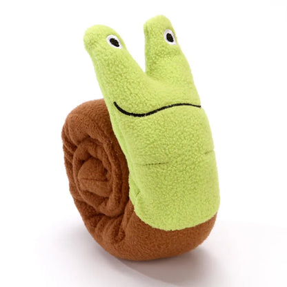 Squeak dog toy in snail or stick shape with hidden food holes for foraging training, measuring 7.5 cm by 7.2 cm